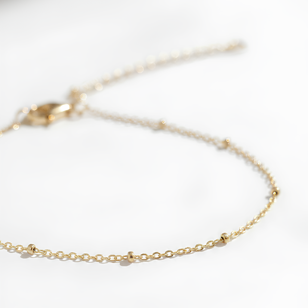 hand-chain-bolinha-aura-banhada-a-ouro-18k-11